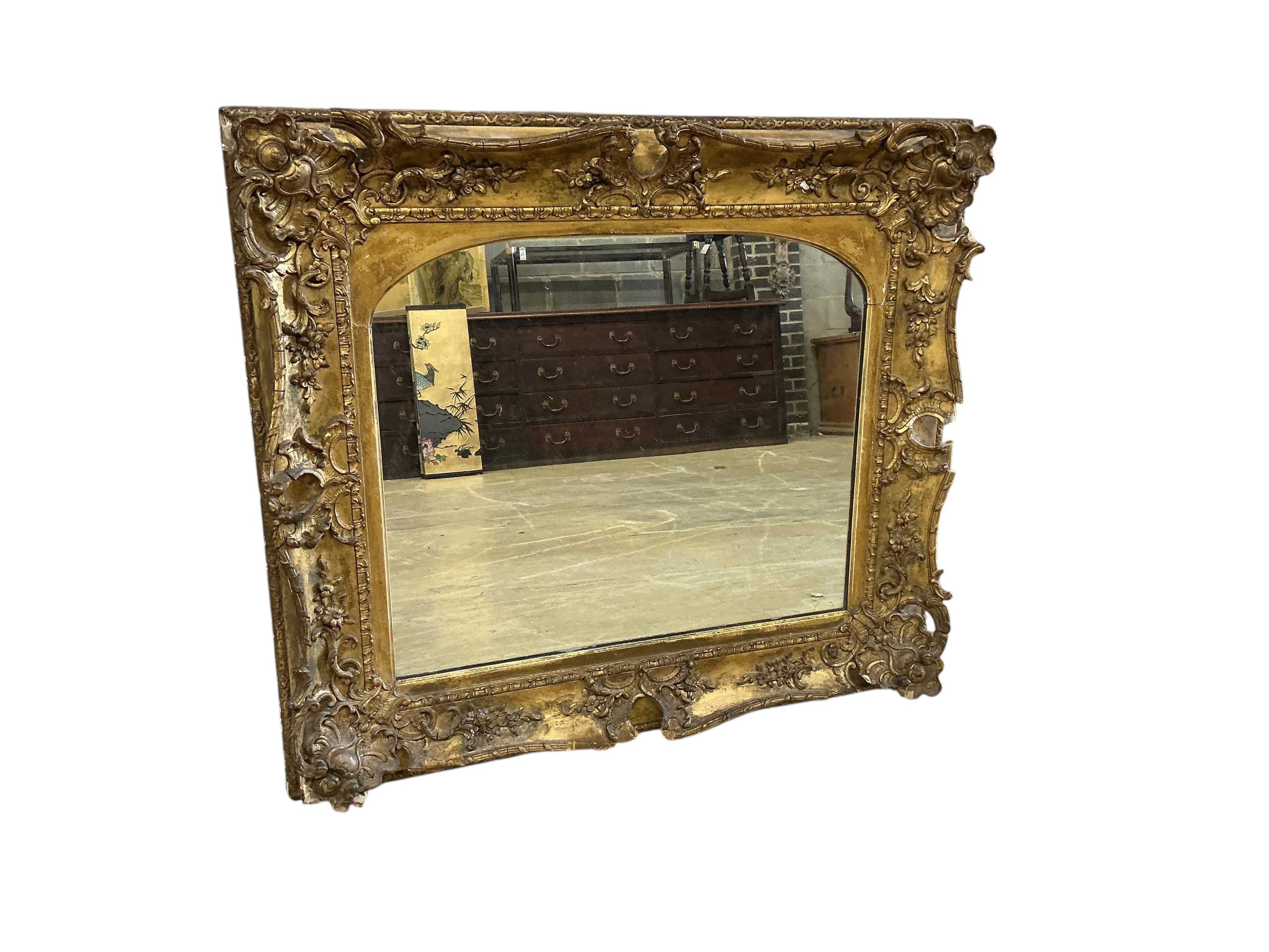 A Victorian giltwood and composition wall mirror converted from a picture frame, width 86cm, height 75cm